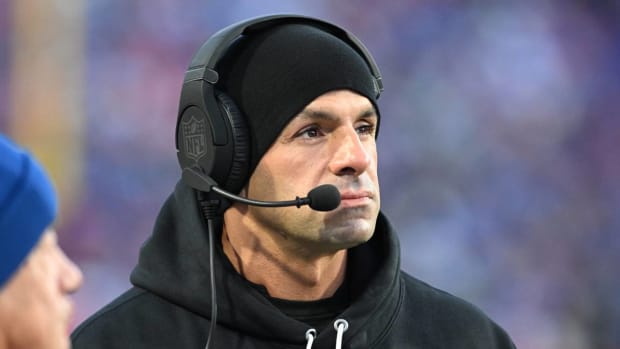Robert Saleh coaches from the sidelines against the Bills.